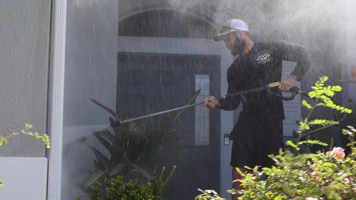 Soft washing a house exterior
