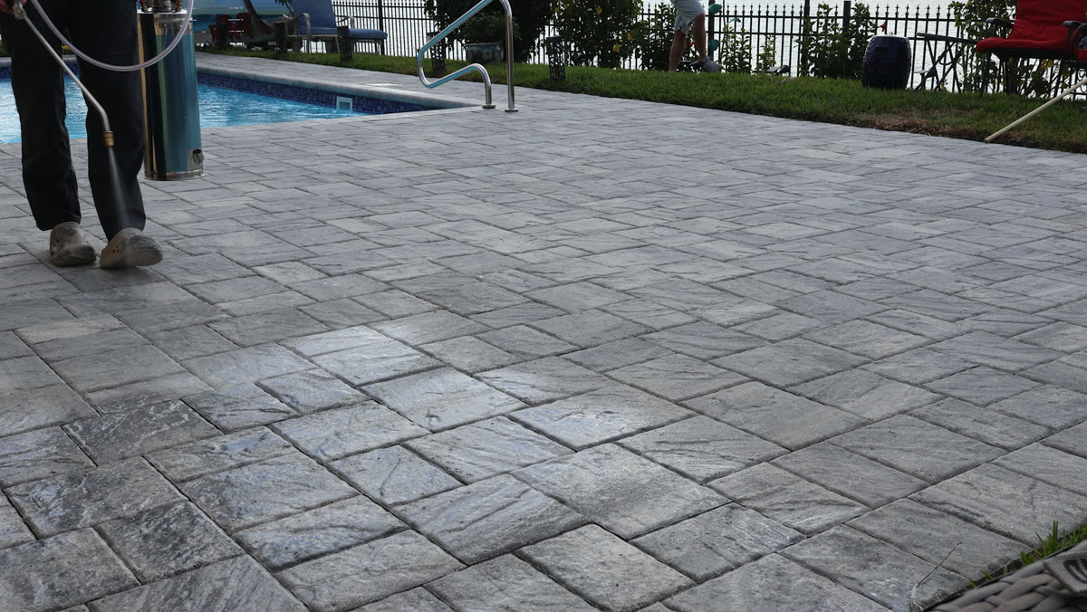 Sealed pavers by a pool