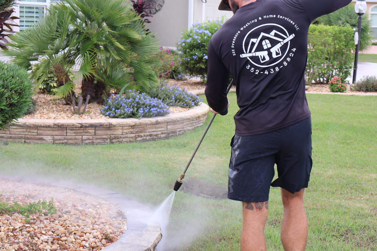 Pressure washing a walkway